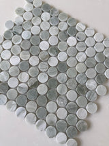 Rockart Green Mix polished penny round mosaic creating a distinctive bathroom floor
