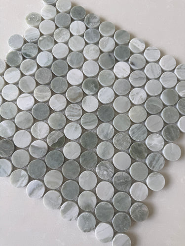 Rockart Green Mix polished penny round mosaic creating a distinctive bathroom floor
