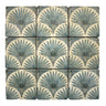 Scallop Travertine Venato mosaic tile with decorative palm-inspired pattern and tumbled finish