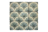 Scallop Travertine Venato mosaic tile with decorative palm-inspired pattern and tumbled finish