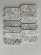 Modern Silver Travertine picket mosaic backsplash in a contemporary kitchen