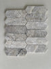 Modern Silver Travertine picket mosaic backsplash in a contemporary kitchen