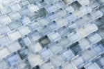 Sky blue glass mosaic tile used as a kitchen backsplash featuring luminous blue tones and contemporary design.