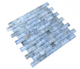 Pool-rated Crystal Aqua Sofia 1x2 glass mosaic tile installed on a luxury swimming pool waterline with reflective glass surfaces.