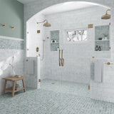 Close-up of Westport Natural Stone Mosaic Tile by Mir, showcasing textured, multi-tonal stone pieces in detailed mosaic pattern.