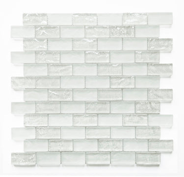 White 1x2 glass mosaic tile used as a kitchen backsplash featuring a classic brick pattern and bright white color palette.
