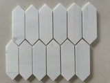 Elegant Dolomite marble picket mosaic accent wall with soft honed finish and natural stone variation