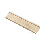 2 1/2 x 12 Honed Ivory Travertine Crown Molding.