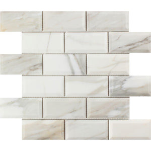 2 x 4 Honed Calacatta Gold Marble Deep-Beveled Brick Mosaic Tile.