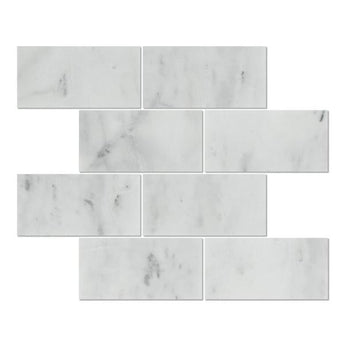 Three 3x6 honed Bianco Mare marble tiles showing smooth, light-colored natural stone with subtle veining, from MosaicBros.com