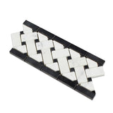 4 3/4 x 12 Polished Bianco Carrara Marble Basketweave Border w/ Black Dots.