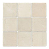 Four 4x4 tumbled Crema Marfil marble tiles, natural stone surface with warm beige tones, from MosaicBros.com