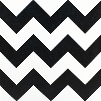 Black and white porcelain tile from Roca's Casablanca Trails 8x8 collection, featuring a geometric pattern for modern interior design.