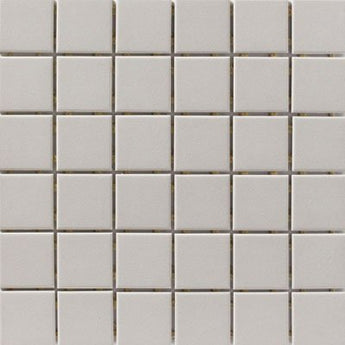Gray porcelain floor tile from Roca's CC Tender Gray 12x12 mosaic collection, featuring a smooth, uniform surface.