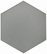 Dark gray hexagon floor tile by Roca, 8x9 inches, with a modern geometric design suitable for contemporary interiors.