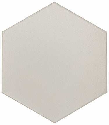 Gray hexagon floor tile from Roca's FLOW TENDER collection, measuring 8x9 inches, displayed in a modern interior setting.