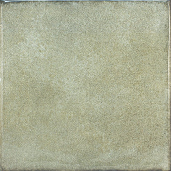 Roca Olaria Green Leaf 2x6 bullnose wall tile showing green leaf patterned ceramic surface with rounded edge detail.