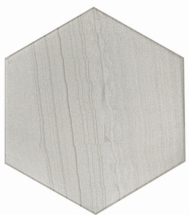 White hexagon floor tile from Roca's Legend Blanco 8x9 collection, showing a glossy surface and intricate geometric pattern.