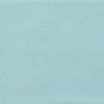 Roca Maiolica Matte Aqua 4x10 wall tiles showing a close-up of blue matte ceramic surface with subtle texture.