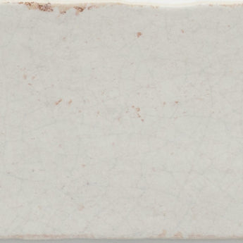 Roca Maiolica Crackled Tender Gray wall tile, 3x12 inches, with a textured crackled finish for interior decoration.