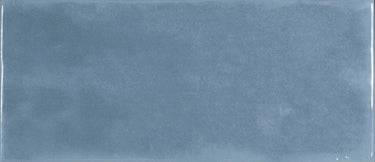 Roca Maiolica Bright Blue Steel wall tile, 4x10 inches, featuring a vibrant blue and steel pattern for decorative wall application