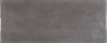 Roca Maiolica matte taupe wall tiles in 11x25 inch size, shown in a close-up image highlighting their textured surface and color.