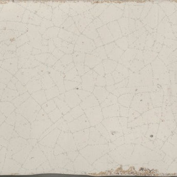 Roca Maiolica Crackled 3x12-inch biscuit wall tile featuring a crackled ceramic glaze pattern on a neutral background.