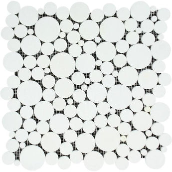 Polished Thassos White Marble Bubbles Mosaic Tile showing glossy white marble with rounded bubble patterns.